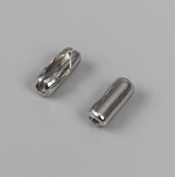 What factors should be considered when selecting materials for metal chain connectors?